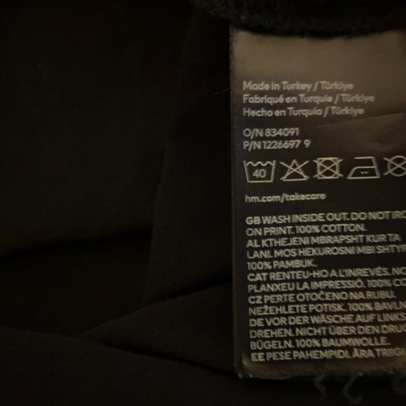 H&M x Smiley World Smiley Face Graphic Black Yellow Paint Drip Youth Tee 8/10 - Picture 5 of 6